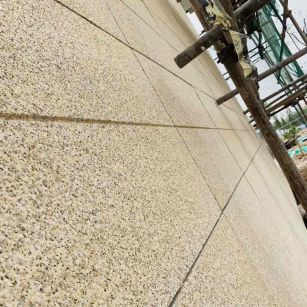 常德 黄金麻花岗岩荔枝面外墙干挂石材效果示例