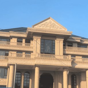 常德黄金麻别墅外墙干挂石材效果示例