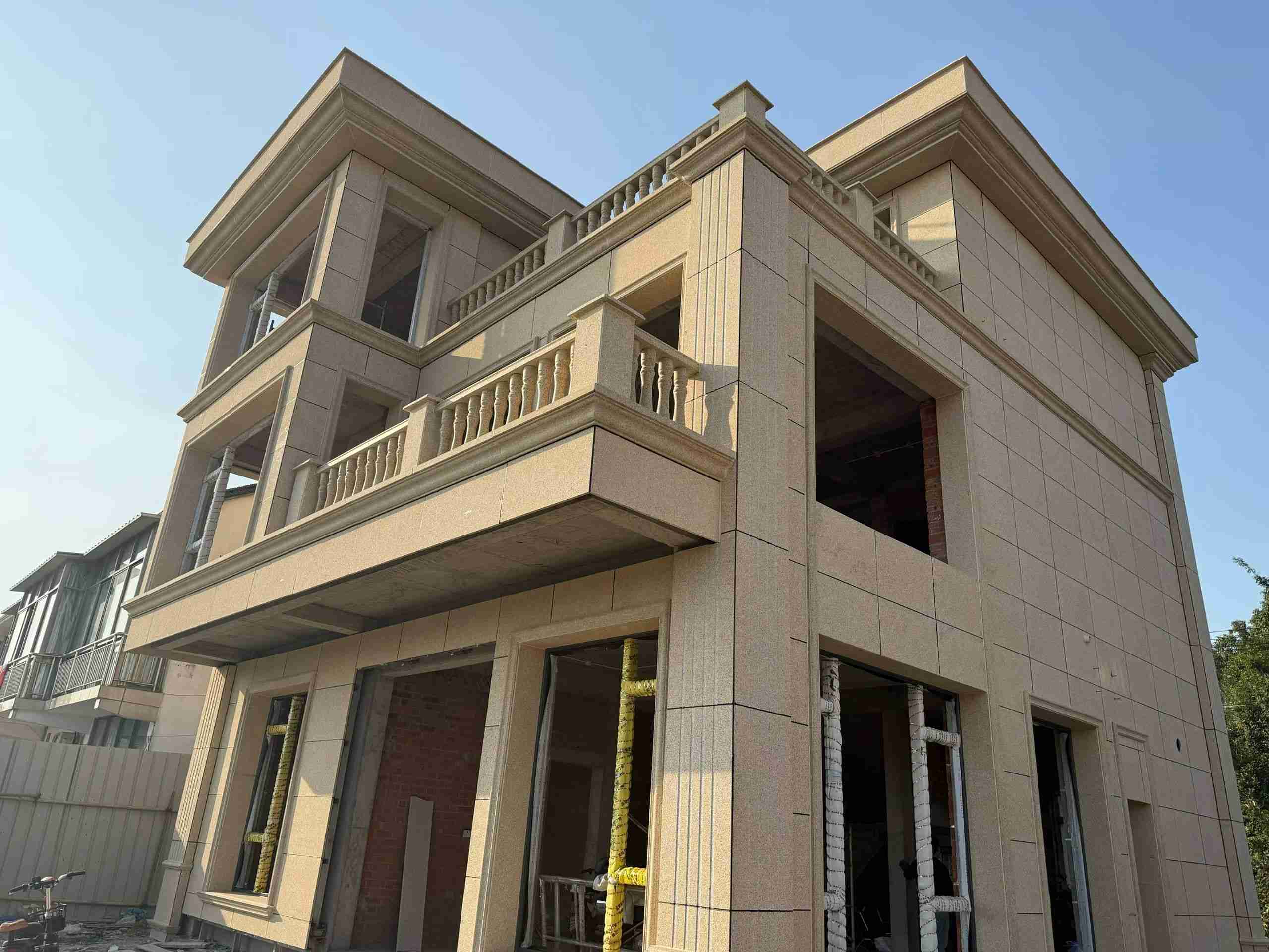 常德 黄金麻花岗岩石材荔枝面外墙干挂效果展示